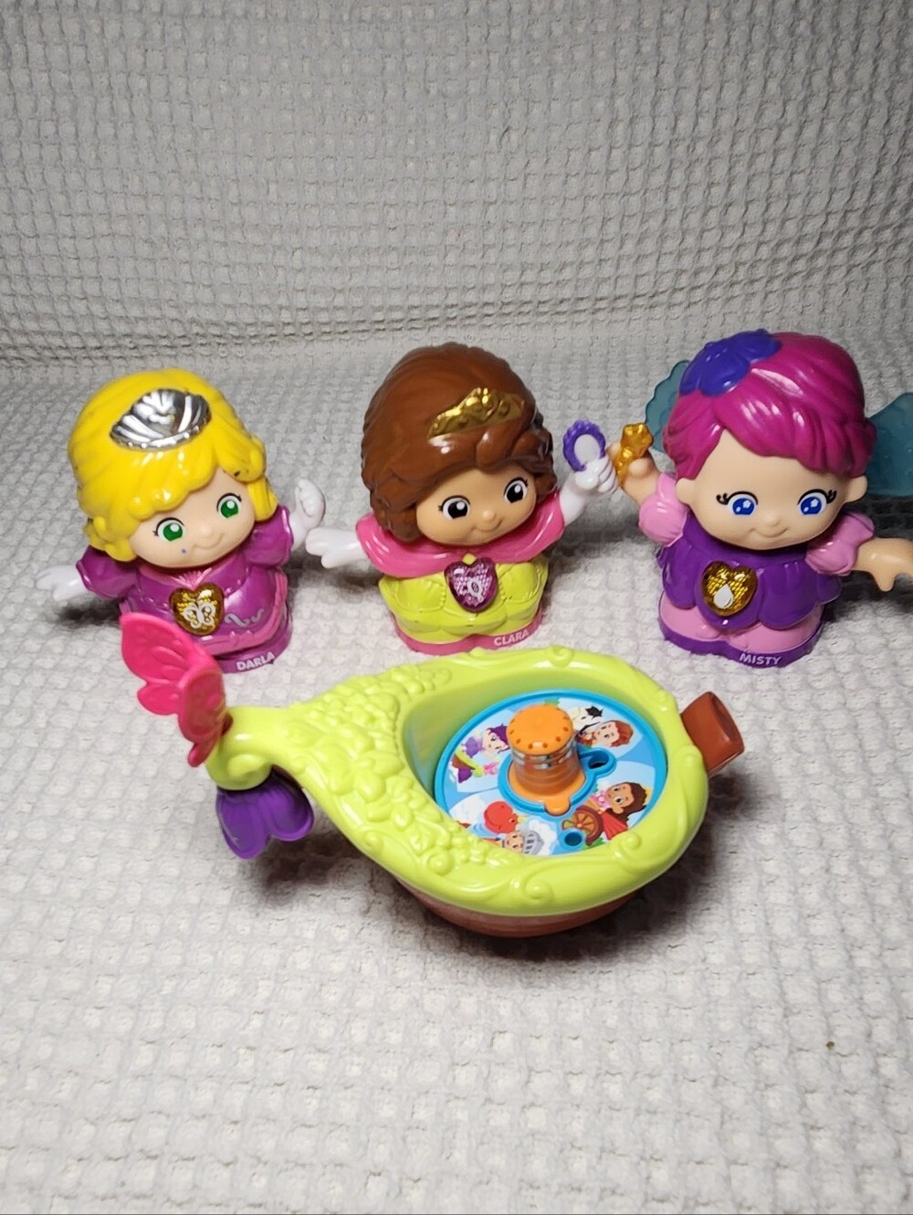 VTech Go! Go! Smart Friends toy figures named Darla, Clara, and Misty